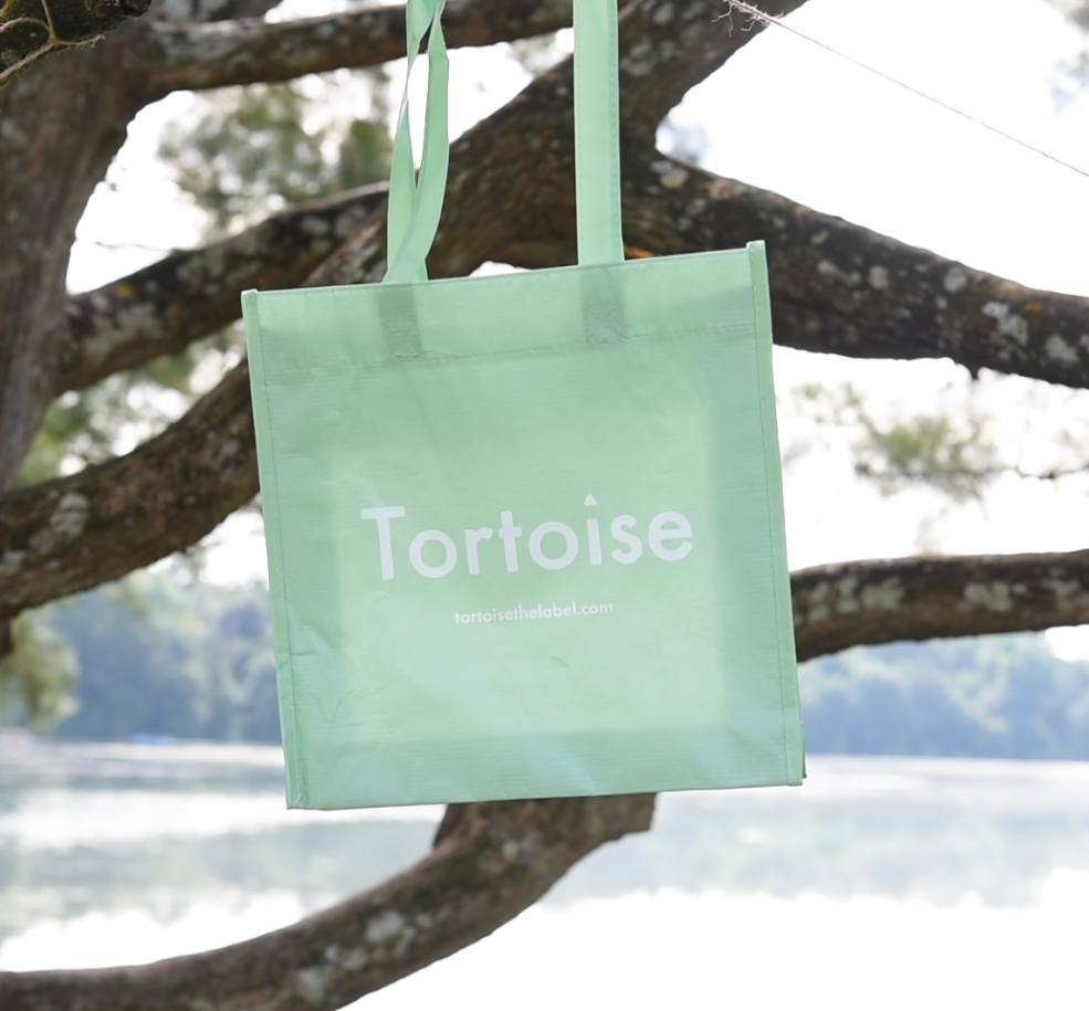 Tortoise The Label Singapore campaign 1.0. Recycled RPET reusable tote bag packaging. Sustainable organic cotton clothes - basic t shirts and tank tops